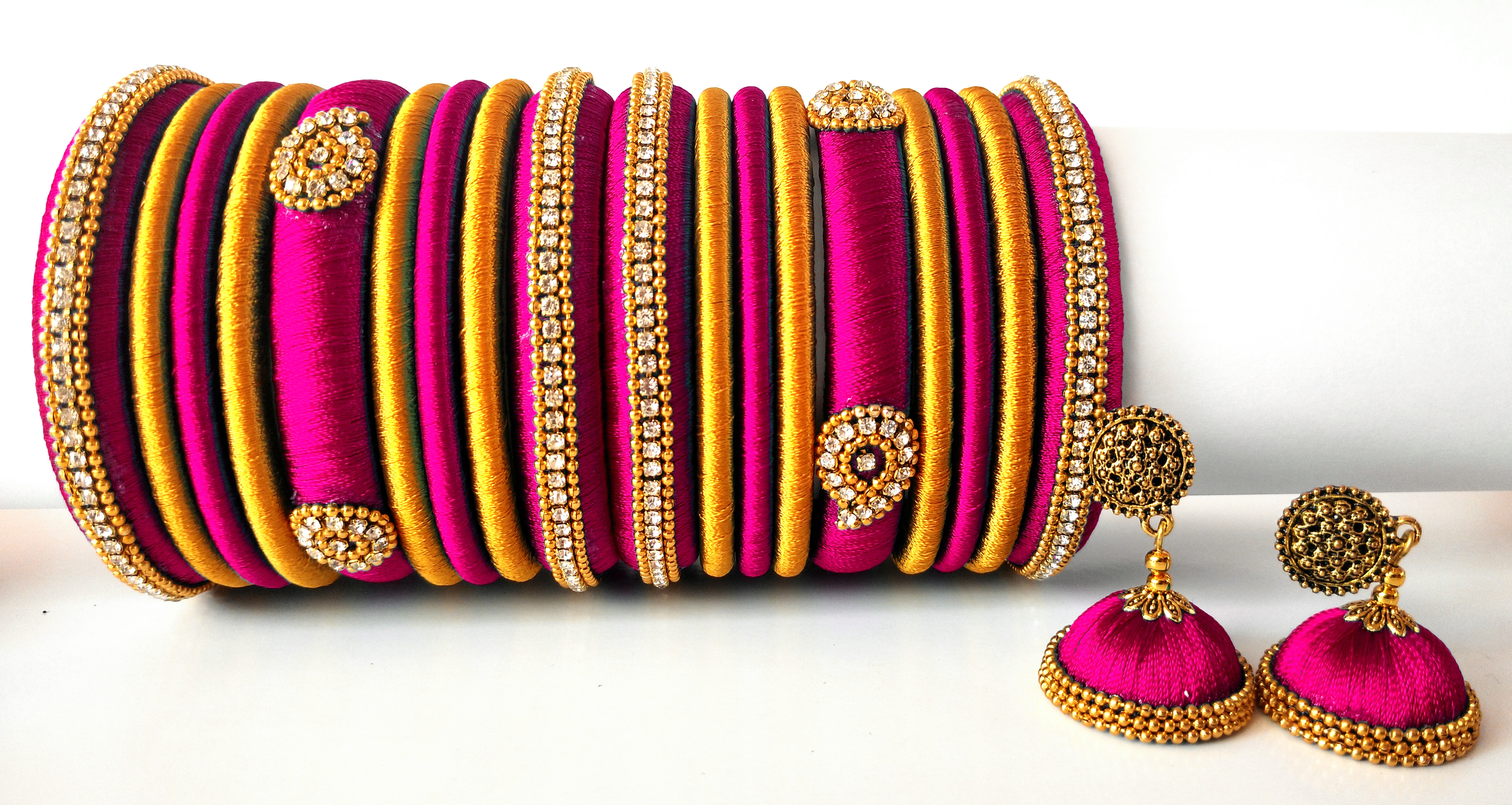 Buy Leaf Design Red And Gold Color Silk Tread Bangles And Earrings Jhumka  (size-2/10) at Amazon.in