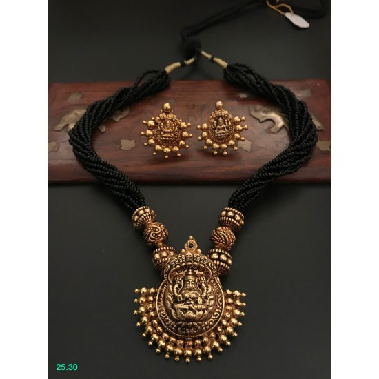 Kanakdharaa - Black Beads with Pure Silver Pendant with Gold Polish Kanakdharaa - Black Beads with Pure Silver Pendant with Gold Polish